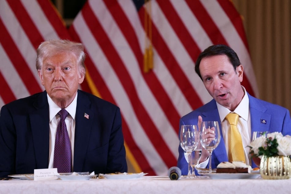 Louisiana's Jeff Landry (r.) speaks during a meeting with Donald Trump and other Republican governors at the Mar-a-Lago Club on January 9, 2025.