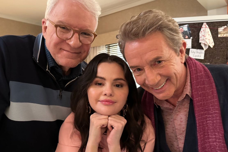 Selena Gomez (c.) poses with her Only Murders in the Building costars Steve Martin (l.) and Martin Short.