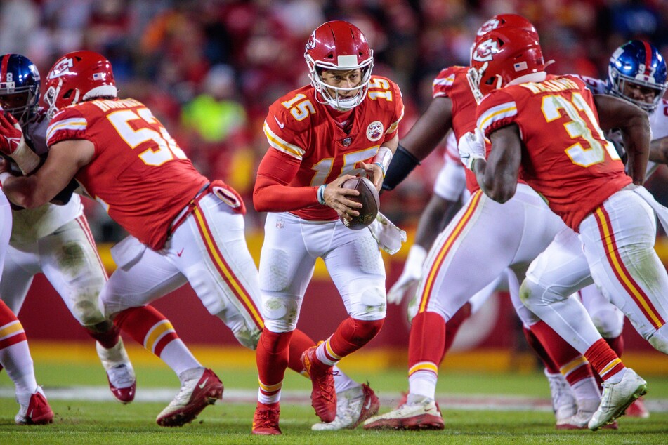 Chiefs quarterback Patrick Mahomes (c) helped lead his team to a decent 4-4 record after beating the Giants on Monday night.