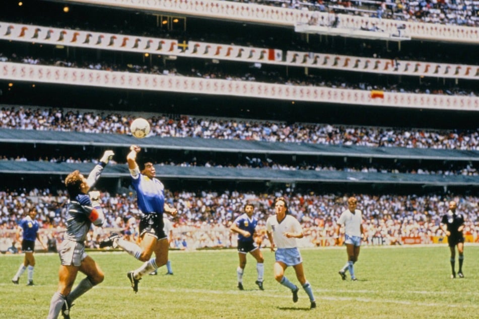 Maradona scoring his infamous "Hand of God" goal against England.