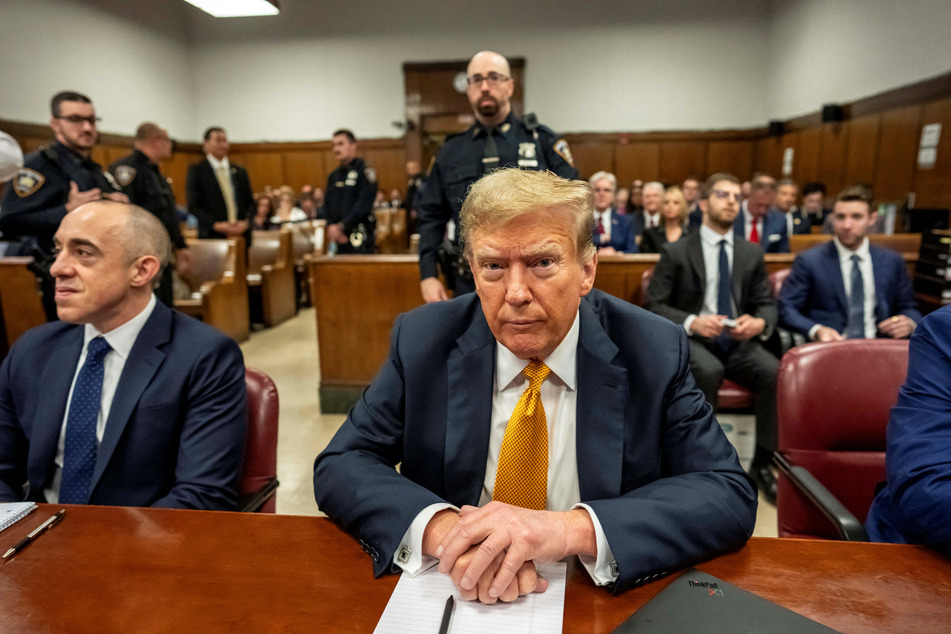 Donald Trump sits for his trial at the Manhattan Criminal Court in New York City.