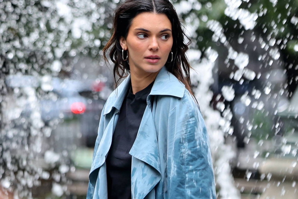 Kendall Jenner turned heads while getting soaking wet during a shoot for Calvin Klein.
