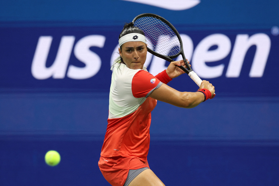 Ons Jabeur of Tunisia in action during her 2022 US Open quarter final match against Australia's Ajla Tomljanovic.