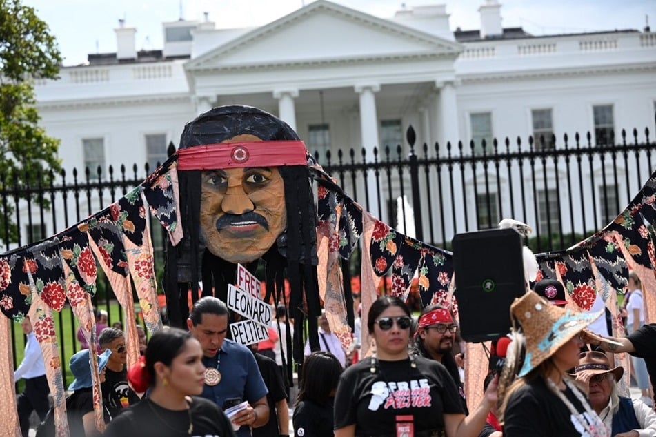 Protesters call for the release of Leonard Peltier during a rally at Lafayette Square across from the White House.