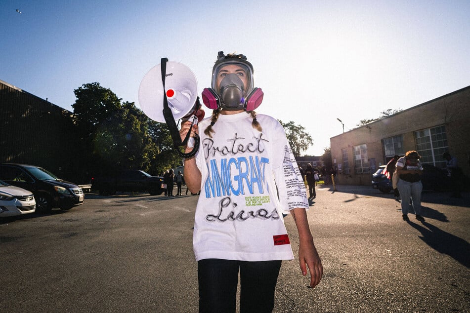 Congressional candidate Kat Abughazaleh rallies with immigrants rights' groups outside the Broadview ICE facility in Illinois on September 26, 2025.