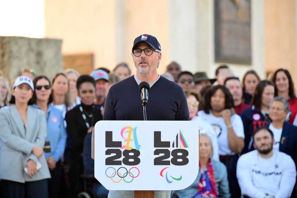 Chairman of the LA2028 Olympics Organizing Committee Casey Wasserman speaks during a ceremonial lighting of the LA28 Olympic cauldron at the Memorial Coliseum in Los Angeles on January 13, 2026.