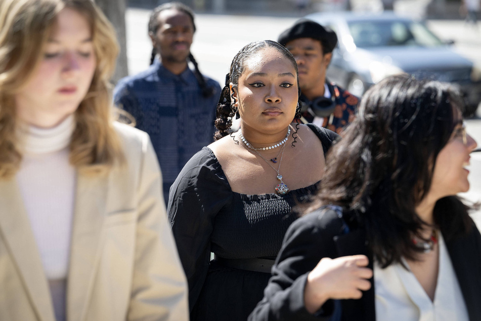 Youth plaintiffs in the Genesis v. Environmental Protection Agency lawsuit walk to the federal courthouse in Los Angeles for a hearing in their case on April 29, 2024.