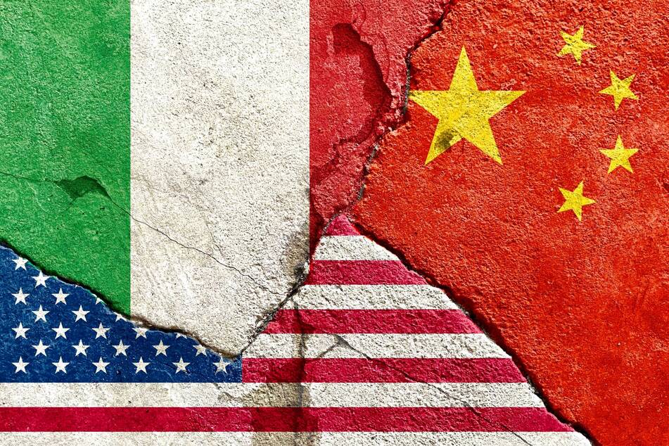 Italian authorities have extradited a Chinese national to the US over allegations of hacking and spying during the Covid-19 pandemic.