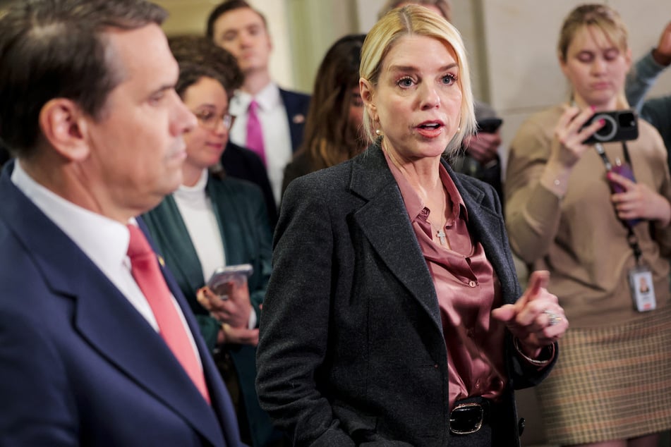 Attorney General Pam Bondi speaks with the media in the Capitol after a briefing on the Jeffrey Epstein files on March 18, 2026 in Washington, DC.