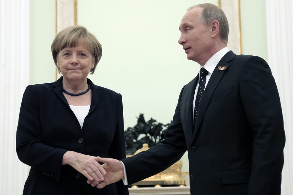 Angela Merkel (l.) und Russlands Präsident Wladimir Putin (72, r.). (Archivbild)