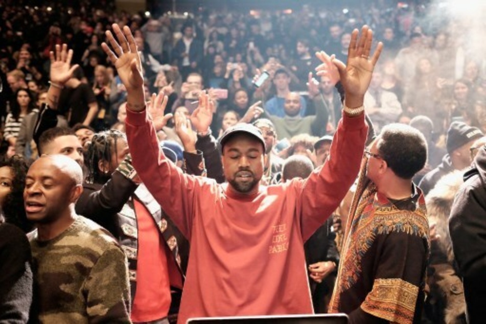 Kanye West (c.) is no stranger to copyright lawsuits, with most being settled out of court.