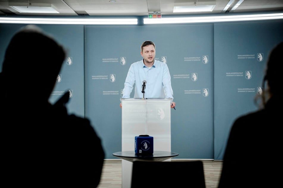 Greenland's Prime Minister Jens-Frederik Nielsen called for cooperation with the US and played down fears of an invasion.