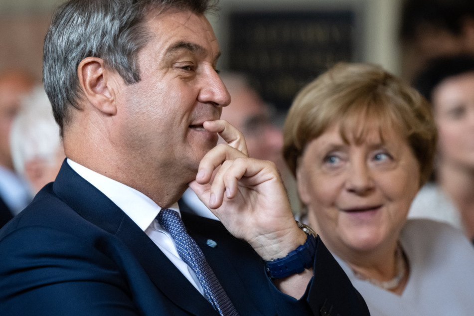 Auf Kuschelkurs: Ministerpräsident Markus Söder (56, l.) und Altkanzlerin Angela Merkel (68) scheinen alte Streitereien überwunden zu haben.