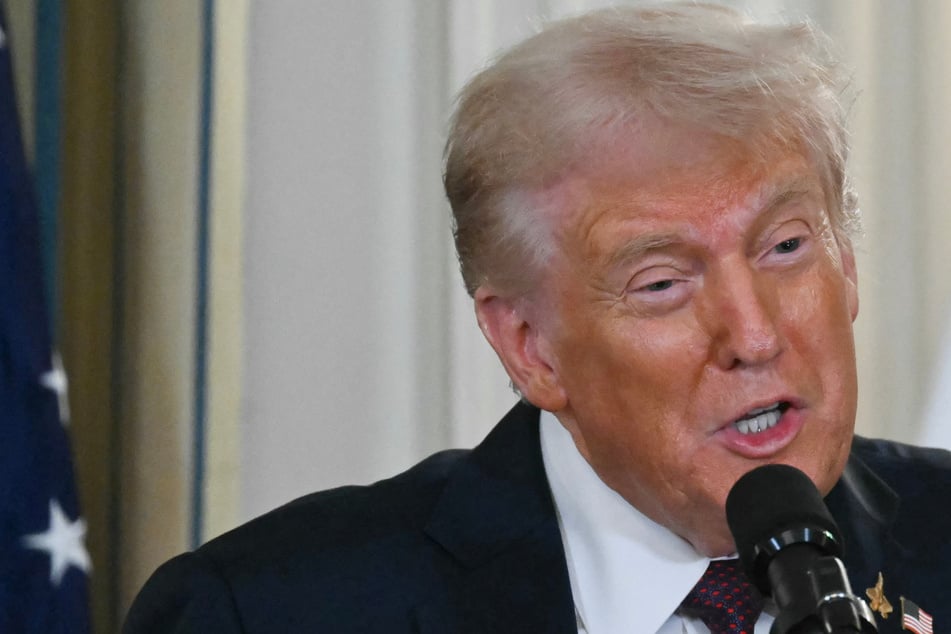 Treasury Department mulls $1 coin with Trump's image – and reveals "first drafts"