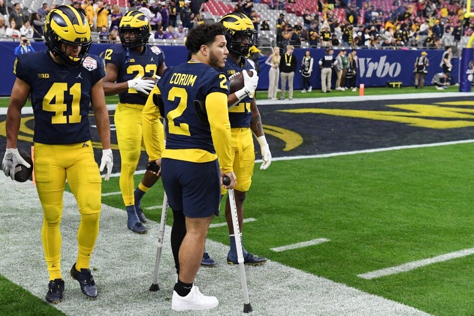 Blake Corum won’t be close enough to 100% strength in time for Michigan's annual Maize and Blue Spring game as he continues to recover from his ACL surgery.
