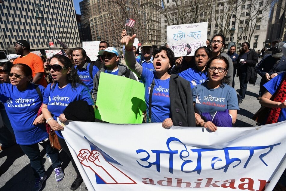 Members of Nepalese activist group Adhikaar rally for immigration reform in Foley Square in New York City.