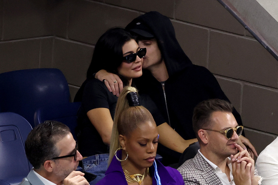 Kylie Jenner and Timothée Chalamet got cozy during the men's singles final at the US Open on Sunday.