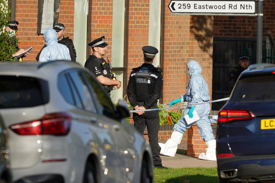 Forensic officers at the scene near the Belfairs Methodist Church in Eastwood Road North, Leigh-on-Sea, Essex, where Amess was killed.