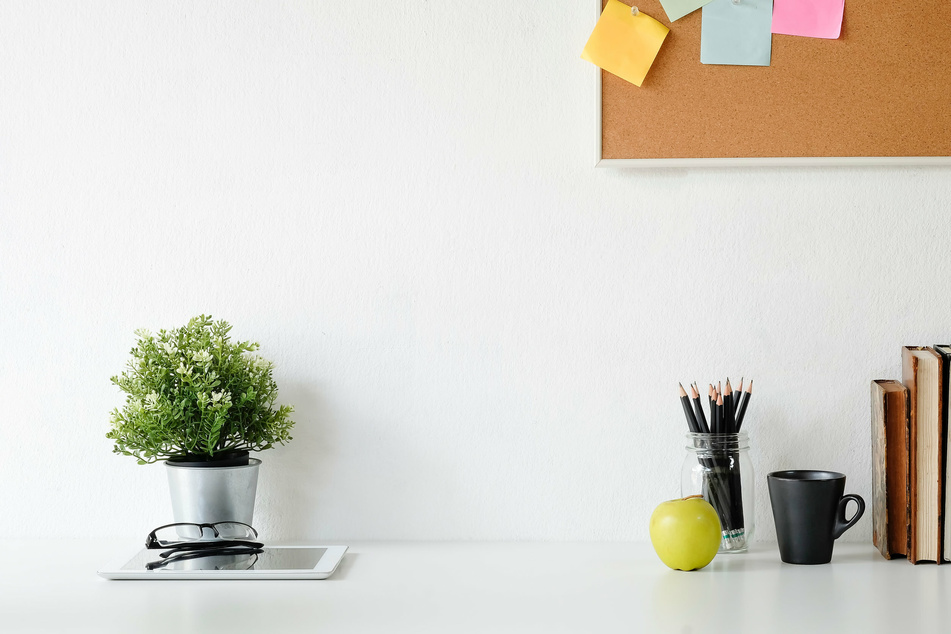 Use a sticky tab to remind yourself to sit or stand up straight.