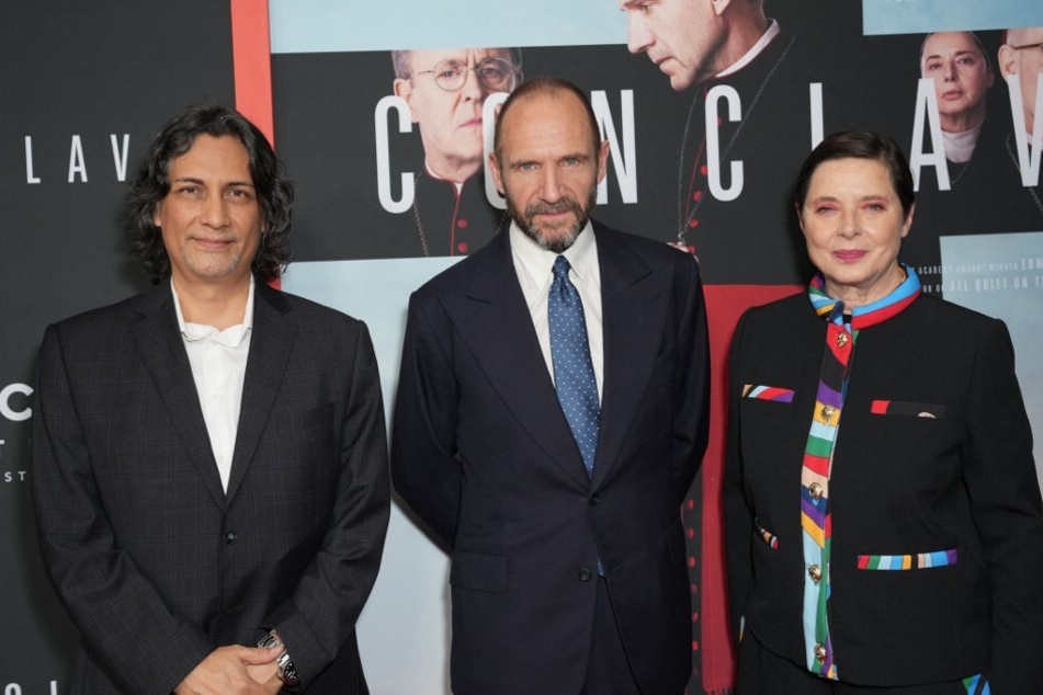 Carlos Diehz, Ralph Fiennes, and Isabella Rossellini attend the "Conclave" New York premiere on October 23, 2024.