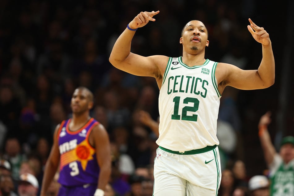 Boston Celtics forward Grant Williams celebrates in his team's win over the Phoenix Suns.