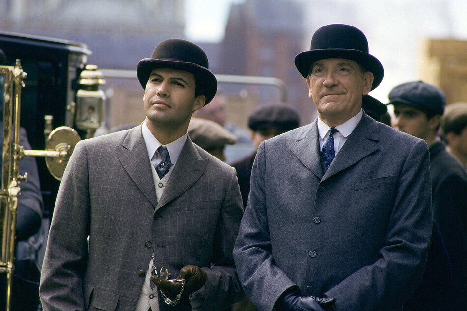 David Warner (r.) alongside Billy Zane in James Cameron's 1997 blockbuster Titanic.