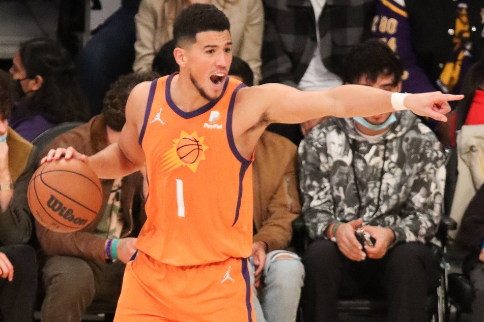 Suns guard Devin Booker scored a game-high 26 points against the Rockets.