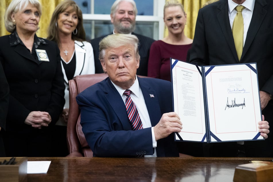 Donald Trump (74) presenting the signed animal cruelty act at the White House in November 2019.