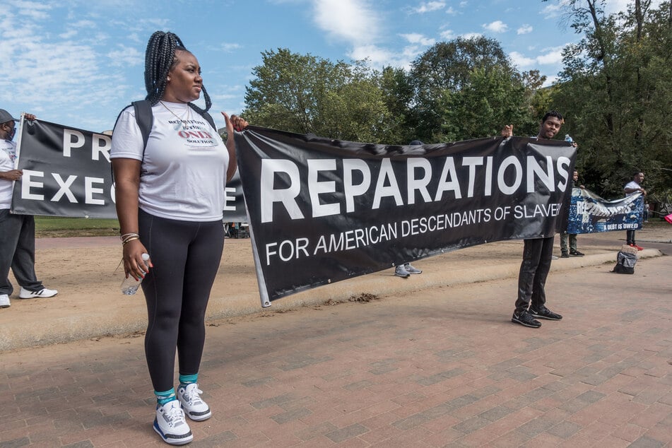 Activists rally outside the White House in October 2021 demanding urgent action on reparations for Black Americans.