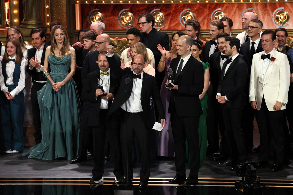 Producer Matthew Rego and the cast and crew of The Outsiders accept the award for Best Musical at the 77th Annual Tony Awards in New York City.