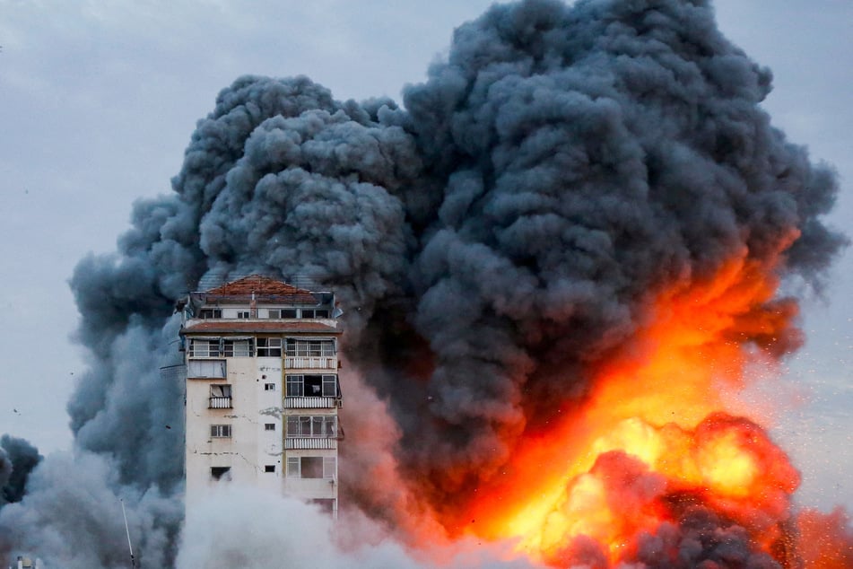 Israeli airstrikes on Gaza City flattened buildings as Prime Minister Benjamin Netanyahu promised an offensive "without reservation and without respite."