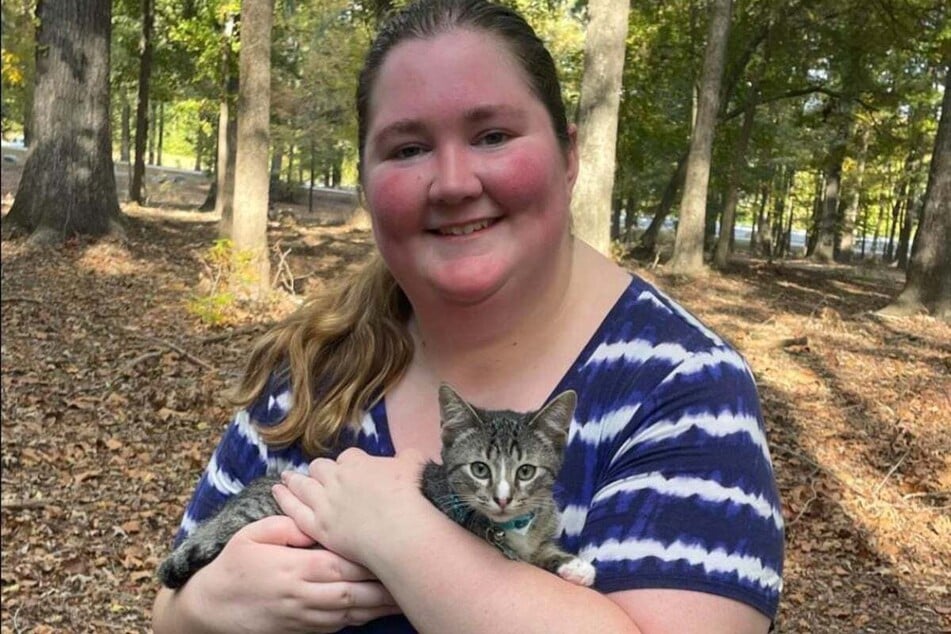 Keighley Eryn Card and the kitten she rescued, now named Jasper.