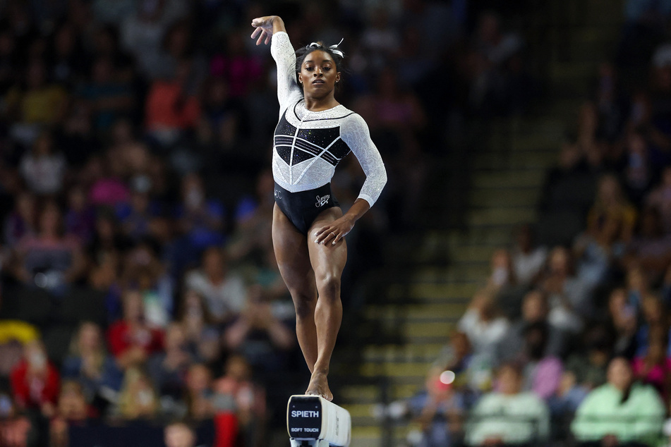Biles scored the highest points total of the US Classic on the balance beam – 14.800.