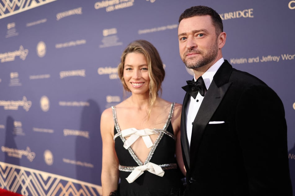 Justin Timberlake's (r.) wife, Jessica Biel, was spotted supporting her hubby at his concert in New York City, dispelling rumors of tension in their marriage.
