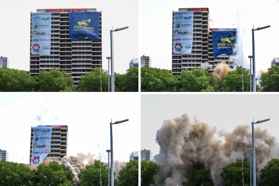 Pünktlich um 12 Uhr wird das Hochhaus "Weißer Riese" mit zwei Sprengungen zu Boden gelegt.