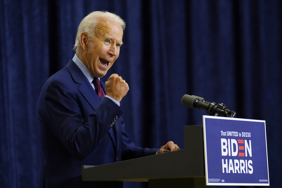 Joe Biden, the Democratic presidential candidate and former U.S. vice president, clenches his fist during a speech.