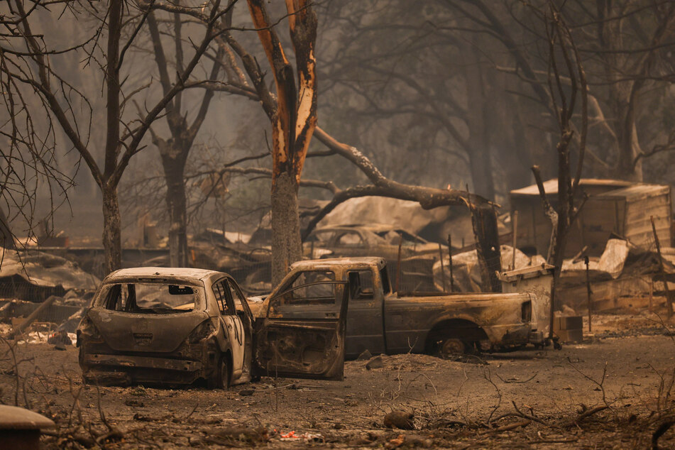 Charred vehicles abandoned in the wake of the devastsating fire.