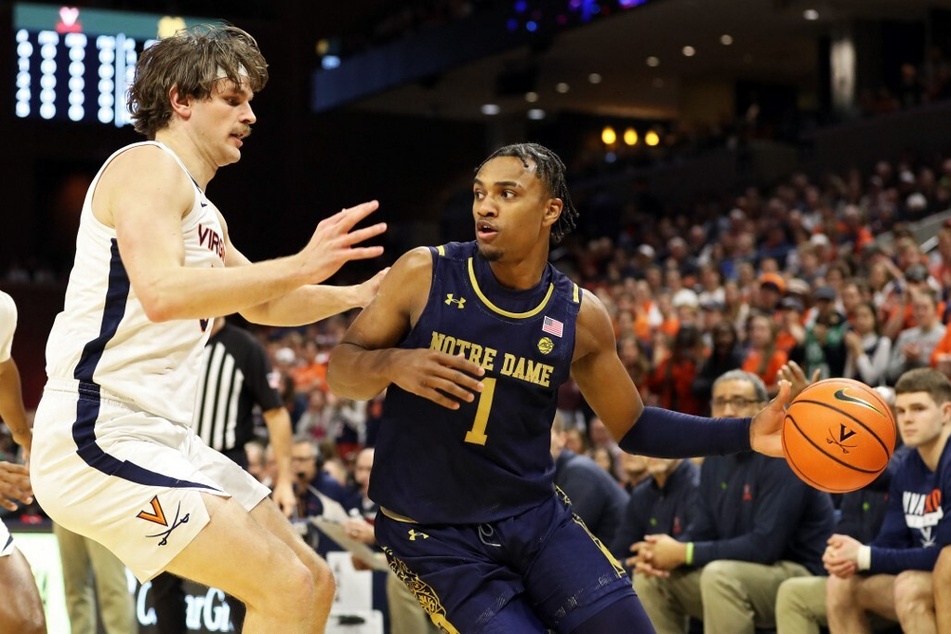 Former Notre Dame standout JJ Starling (r.) has announced he will be coming back home to New York to play for Syracuse basketball under new head coach Adrian Autry.