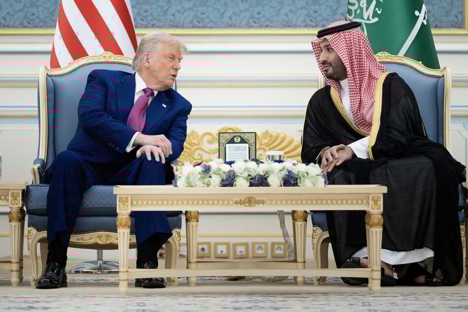 US President Donald Trump (l.) and Saudi Crown Prince Mohammed bin Salman attend a bilateral meeting in Riyadh on May 13, 2025.