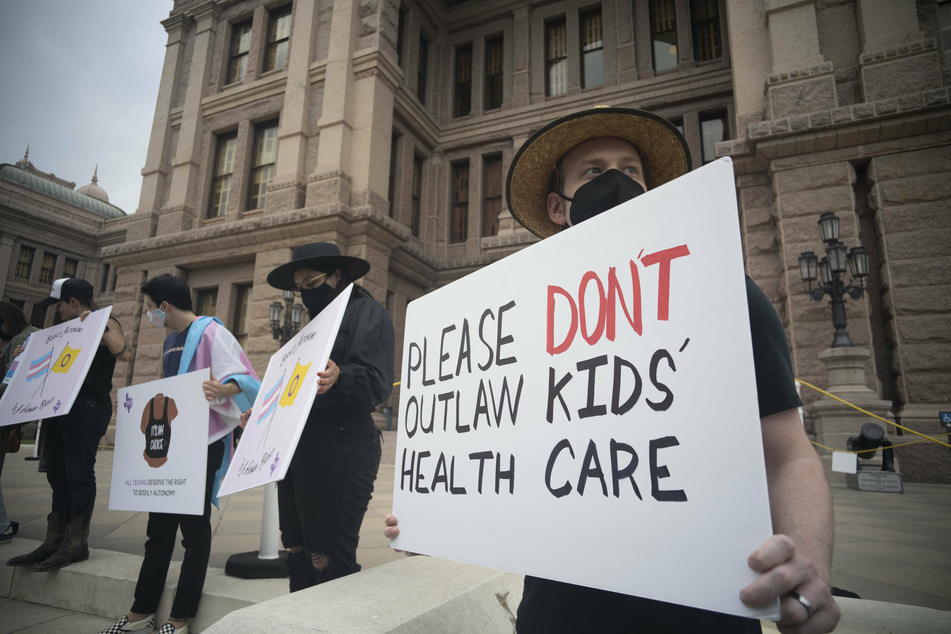 Activists in Austin protest Texas' new anti-trans legislation.