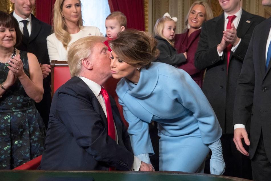 In a recent interview, former President Donald Trump (center l.) shared his reaction after his wife Melania Trump (center r.) revealed that she is pro-choice.