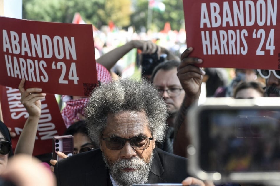 Independent presidential candidate Dr. Cornel West stands with protesters in Union Park as they prepare to march before the start of the Democratic National Convention.