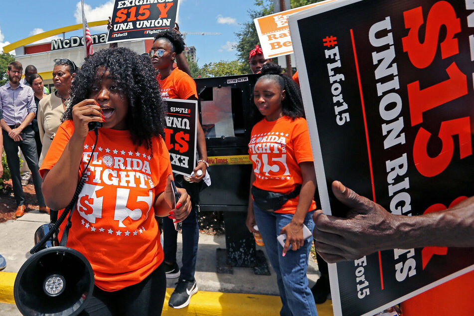 Fight for $15 protesters outside a McDonald's in Fort Lauderdale demand union rights and wage increases.