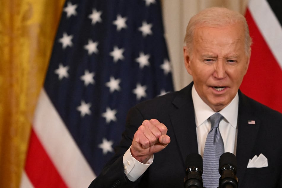 Biden lashes out at media as election pressure mounts