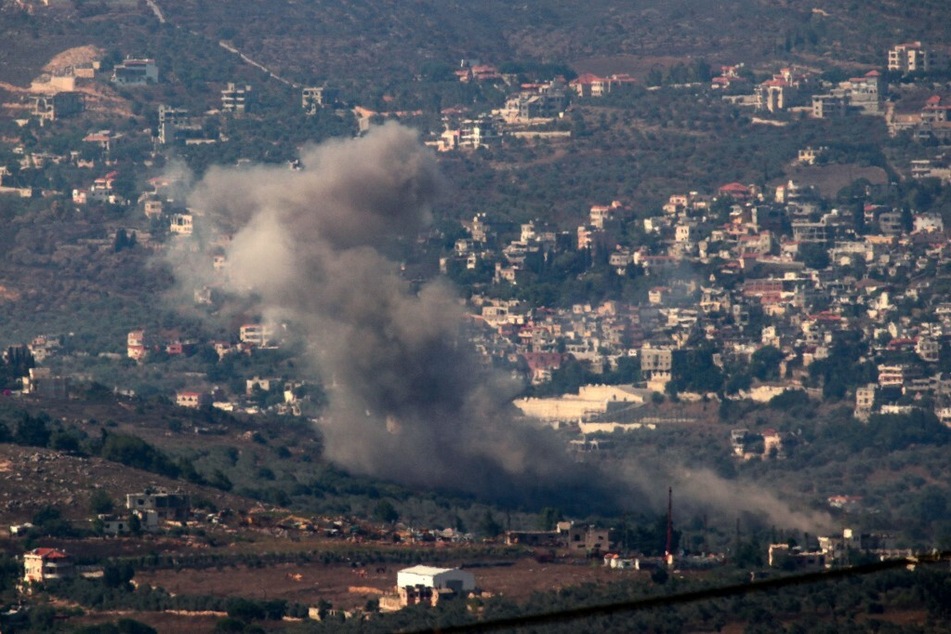 Smoke billows from the site of an Israeli strike that targeted the southern Lebanese village of Kfar Kila on August 9, 2024.