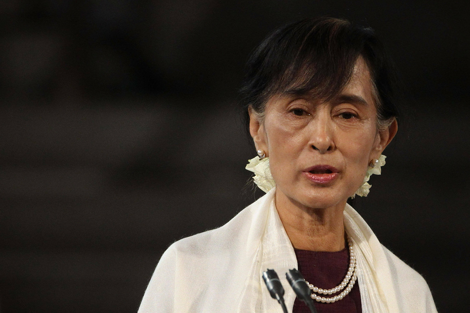 Nobel laureate Aung San Suu Kyi imprisoned after "farcical" Myanmar trial