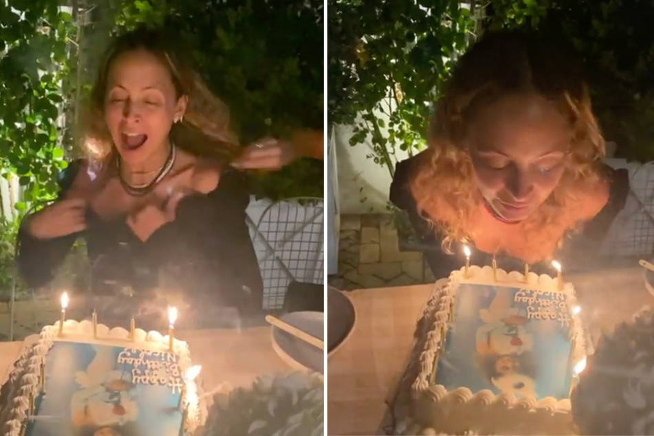 Nicole Richie's hair briefly went up in flames as she blew out the candles on her birthday cake.