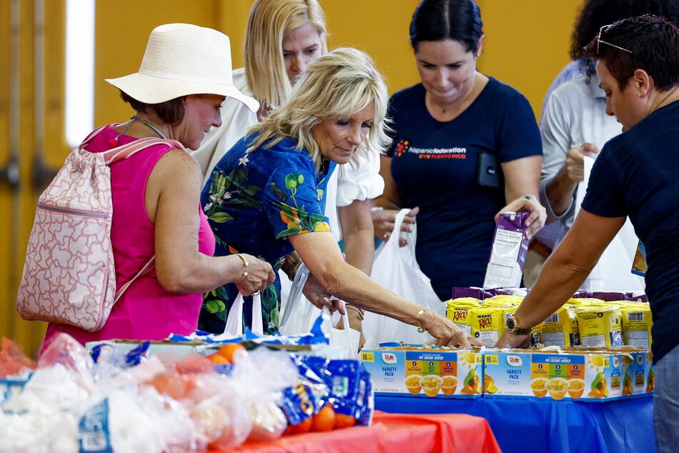 First Lady Jill Biden packed bags of food during her visit with the president to Centro Sor Isolina Ferre Aguayo School in Ponce, Puerto Rico on Monday.