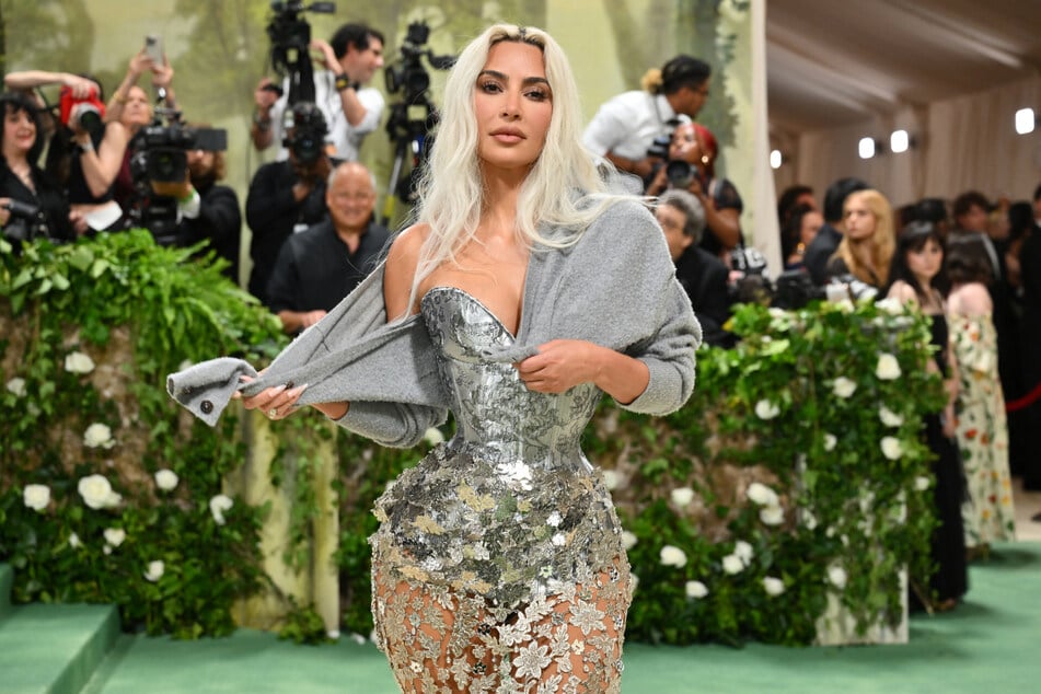 Kim Kardashian's Met Gala look was meant to look like she'd "overslept" after a lavish night out and grabbed a beau's sweater.