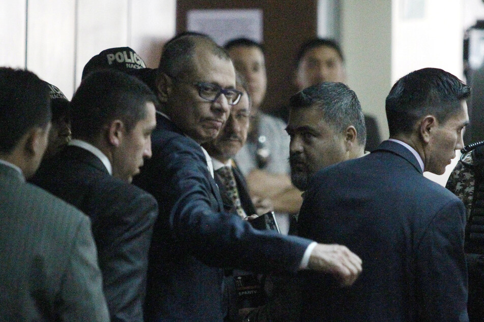 Former Ecuadorean Vice President Jorge Glas reacts as he arrives to court in Quito to attend his trial on bribery from Brazilian construction company Odebrecht.